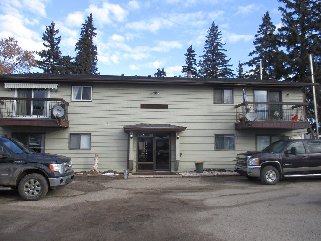 Two-storey apartment building with siding