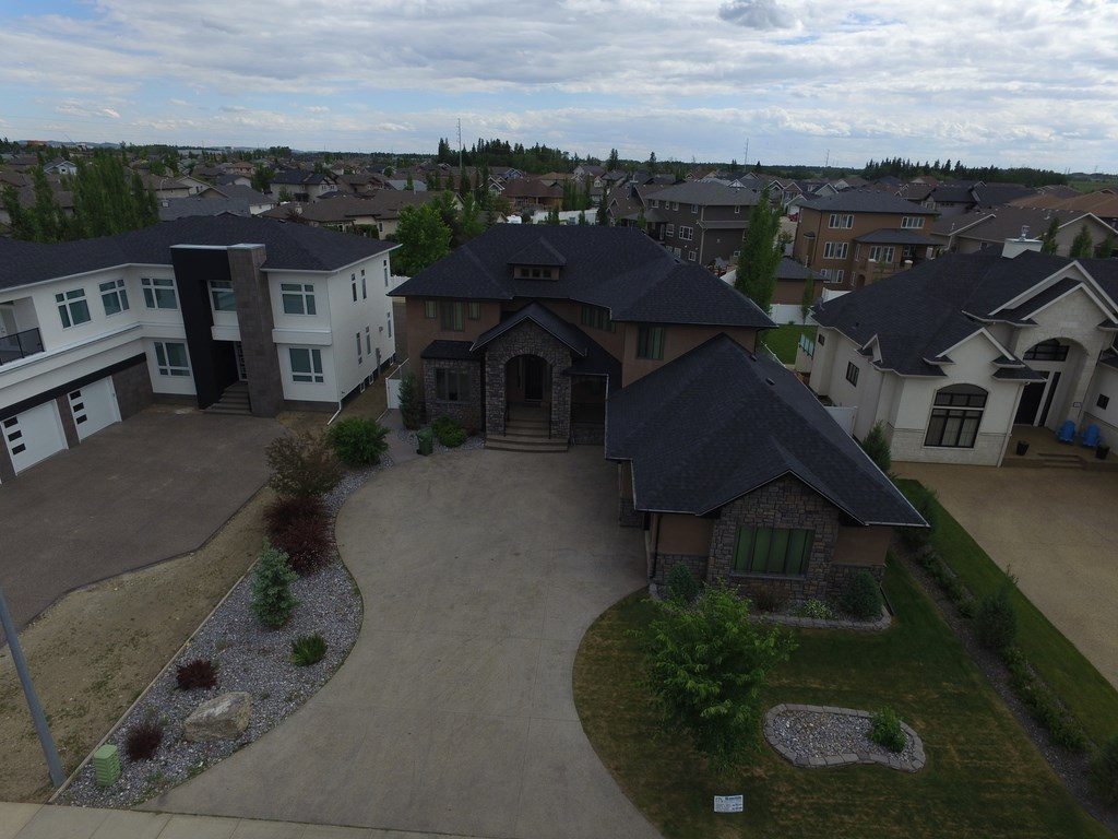 Aerial view of a Lacombe home with a new roof by Smith Roofing & Siding
